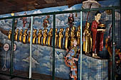 Bagan Myanmar. Shwezigon pagoda. The precinct is full of numerous images, inscribed bells, stone inscriptions and other paraphernalia.  